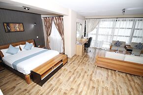 WE Hotel and Suites