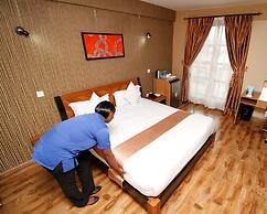 WE Hotel and Suites