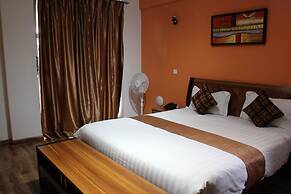 WE Hotel and Suites