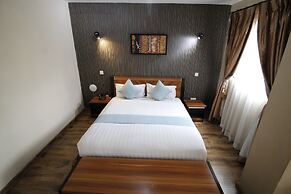 WE Hotel and Suites