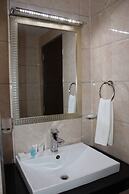 WE Hotel and Suites