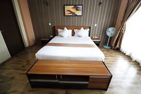 WE Hotel and Suites