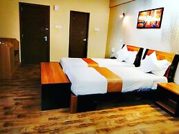WE Hotel and Suites
