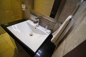 WE Hotel and Suites