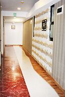 WE Hotel and Suites