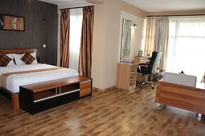 WE Hotel and Suites