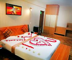 WE Hotel and Suites