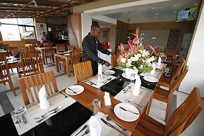 WE Hotel and Suites