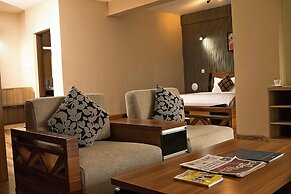 WE Hotel and Suites