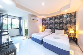 Bed by Tha-Pra Hotel and Apartment