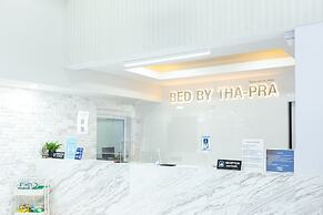 Bed by Tha-Pra Hotel and Apartment