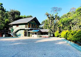 Falling Water Resort by Travent Mug