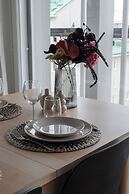 Modern 2BR Apartment with Sauna & Large Balcony