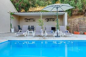 Deja Blue Beach Pool House by Estia