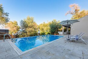 Deja Blue Beach Pool House by Estia