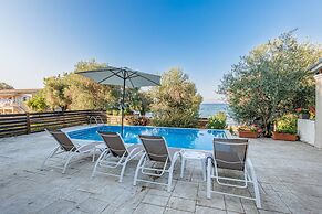 Deja Blue Beach Pool House by Estia