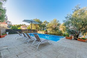 Deja Blue Beach Pool House by Estia