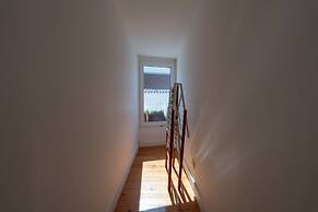 Bairro Alto Tiny Studio by Homing
