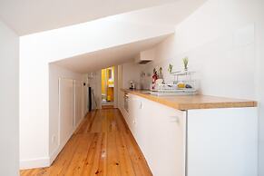 Bairro Alto Tiny Studio by Homing