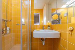 Bairro Alto Tiny Studio by Homing