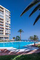 Bright Coastal Apartment With Pool