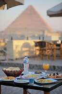 Aziz Egypt Pyramids View