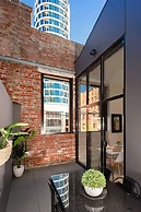 Unwind Bond Quarter Apartment 106