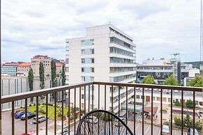 Modern 1BR Home with Sauna & Balcony