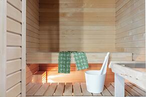 Modern 1BR Home with Sauna & Balcony