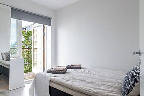 Modern 1BR Home with Sauna & Balcony