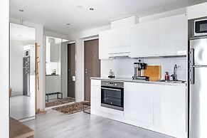 Modern 1BR Home with Sauna & Balcony