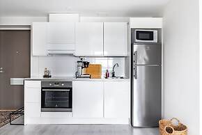 Modern 1BR Home with Sauna & Balcony