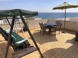 Coastal Holiday Home With Shared Pool