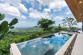 Mountainside Home with Modern Design, Sweeping Ocean Views & Private S