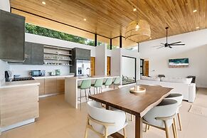 Mountainside Home with Modern Design, Sweeping Ocean Views & Private S