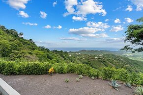 Mountainside Home with Modern Design, Sweeping Ocean Views & Private S