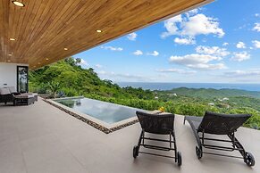 Mountainside Home with Modern Design, Sweeping Ocean Views & Private S