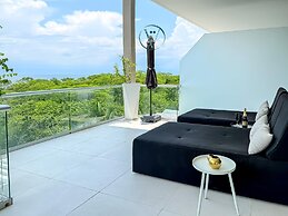 Luxury 2BR Bolongo Ocean View Private Beach