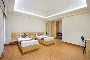 Fabhotel White Pearl