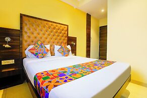 Fabhotel New Silver Elite