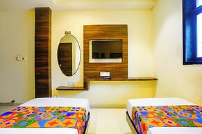 Fabhotel New Silver Elite