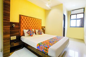 Fabhotel New Silver Elite