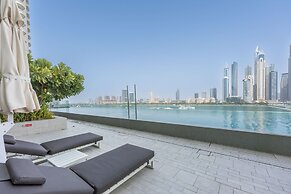 Mesmerizing 2BR in Emaar Beachfront With Sea Views