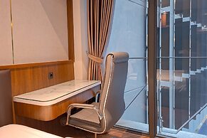 Modern Rustic Studio Apartment At Carstensz Residence