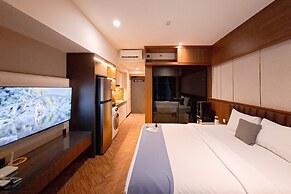 Modern Rustic Studio Apartment At Carstensz Residence