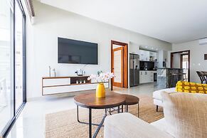 Tropical 2BR Retreat - Terrace, BBQ and Pool