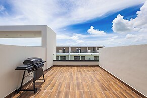 Tropical 2BR Retreat - Terrace, BBQ and Pool
