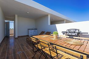 Tropical 2BR Retreat - Terrace, BBQ and Pool