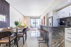 Tropical 2BR Retreat - Terrace, BBQ and Pool