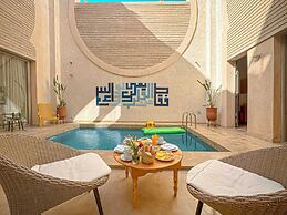 Riad Timija